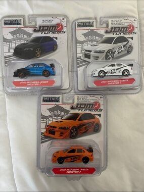(3) bundle of 2002 Mitsubishi Lancer Evolution 7 Die-Cast Cars